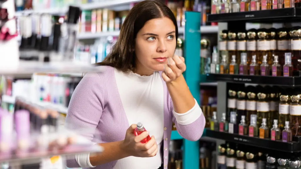 smelling perfume in store